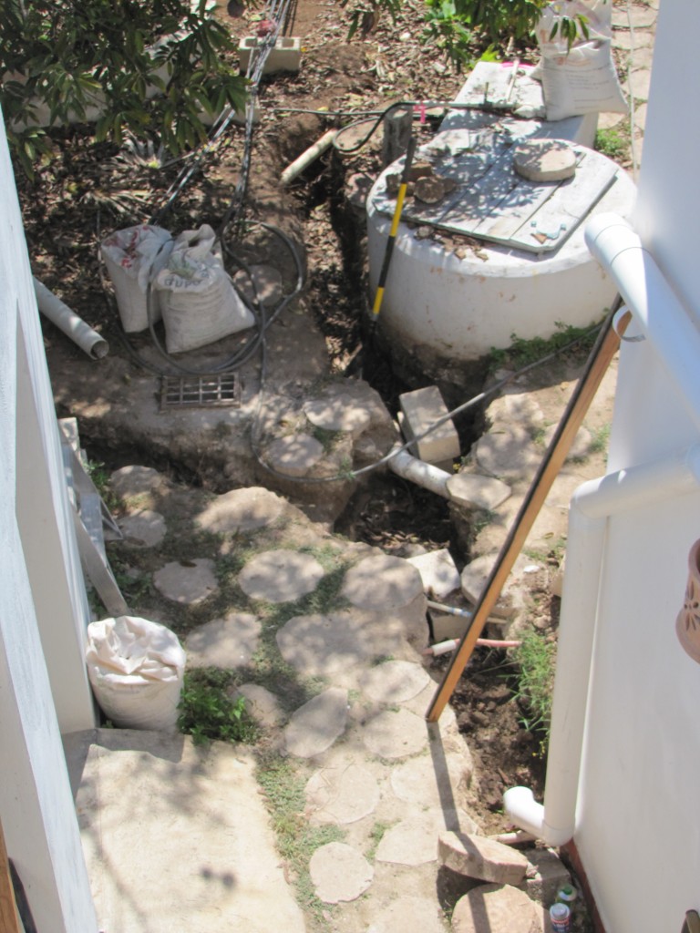 French drains. (Doing archeology near the well in our backyard.) What fun.